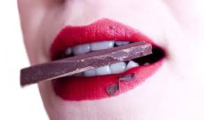 woman eating chocolate